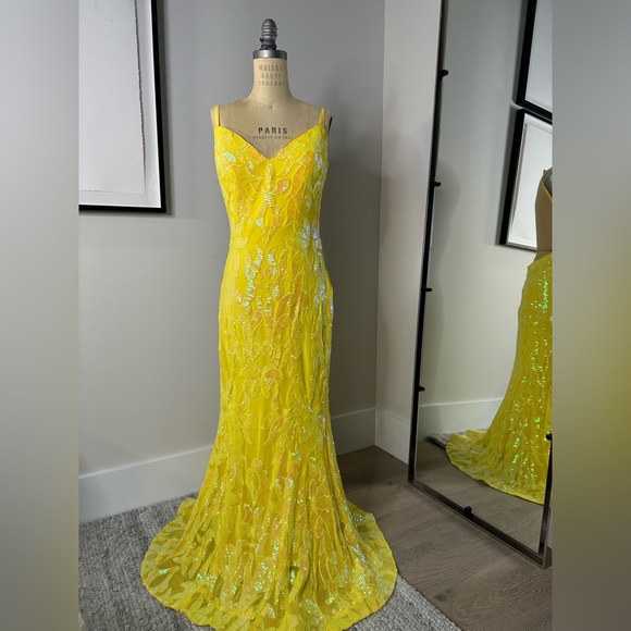 JoVani Yellow Dress
The Jovani 07784A Yellow Pattern Sequin Embellished Gown - Picture 7 of 7